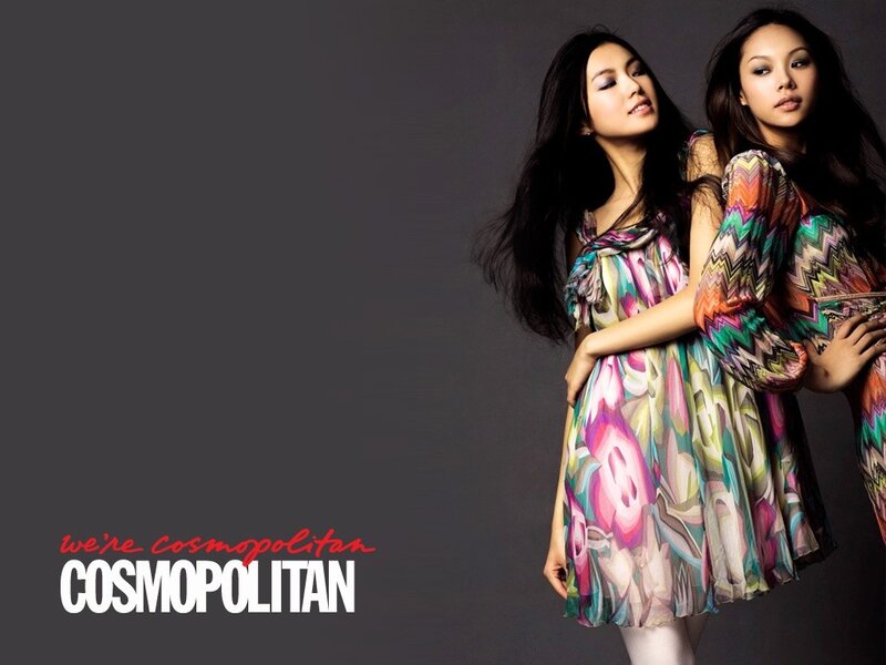 Two Women in Patterned Dresses — Gray