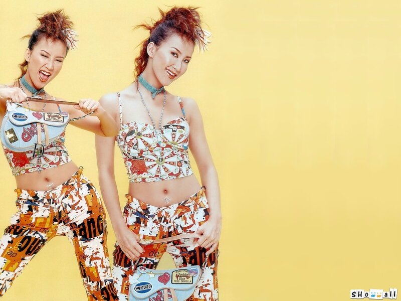 Two women in patterned outfits