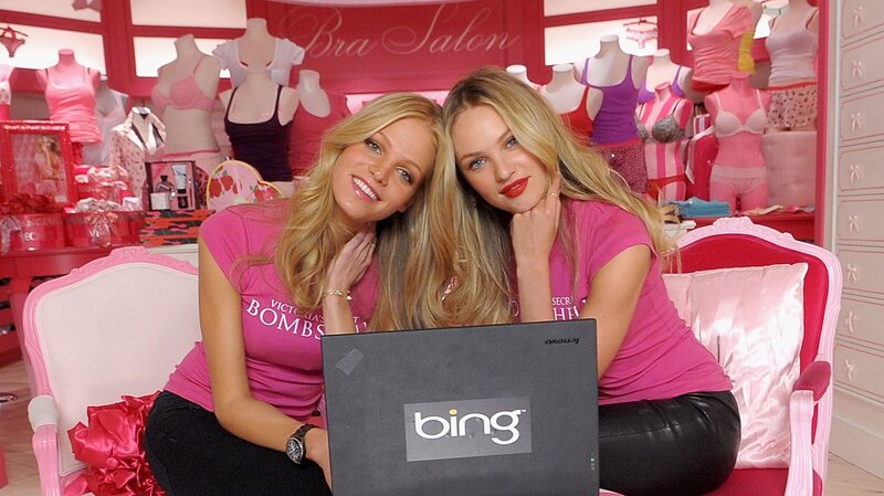 Two Women in Pink Shirts — Playful
