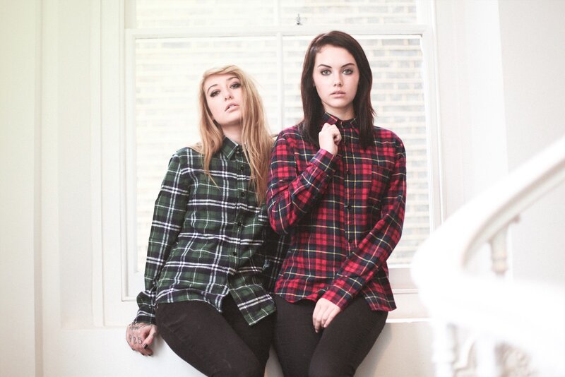 Two women in plaid shirts