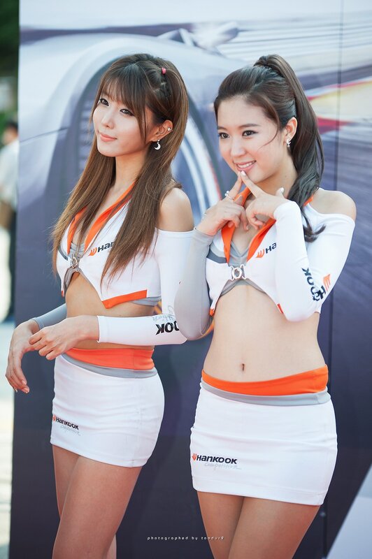 two women in promotional outfits
