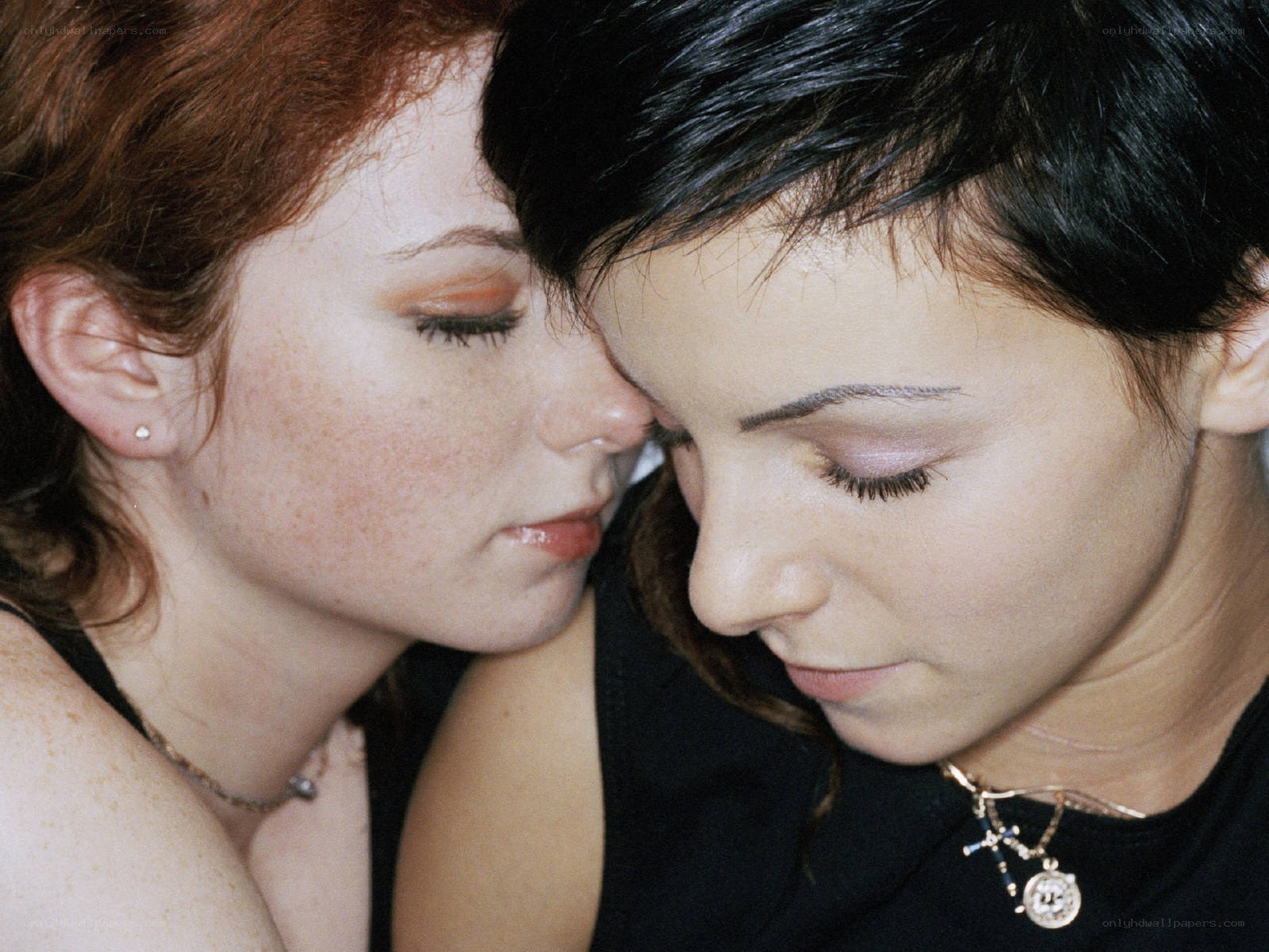 two women in quiet embrace