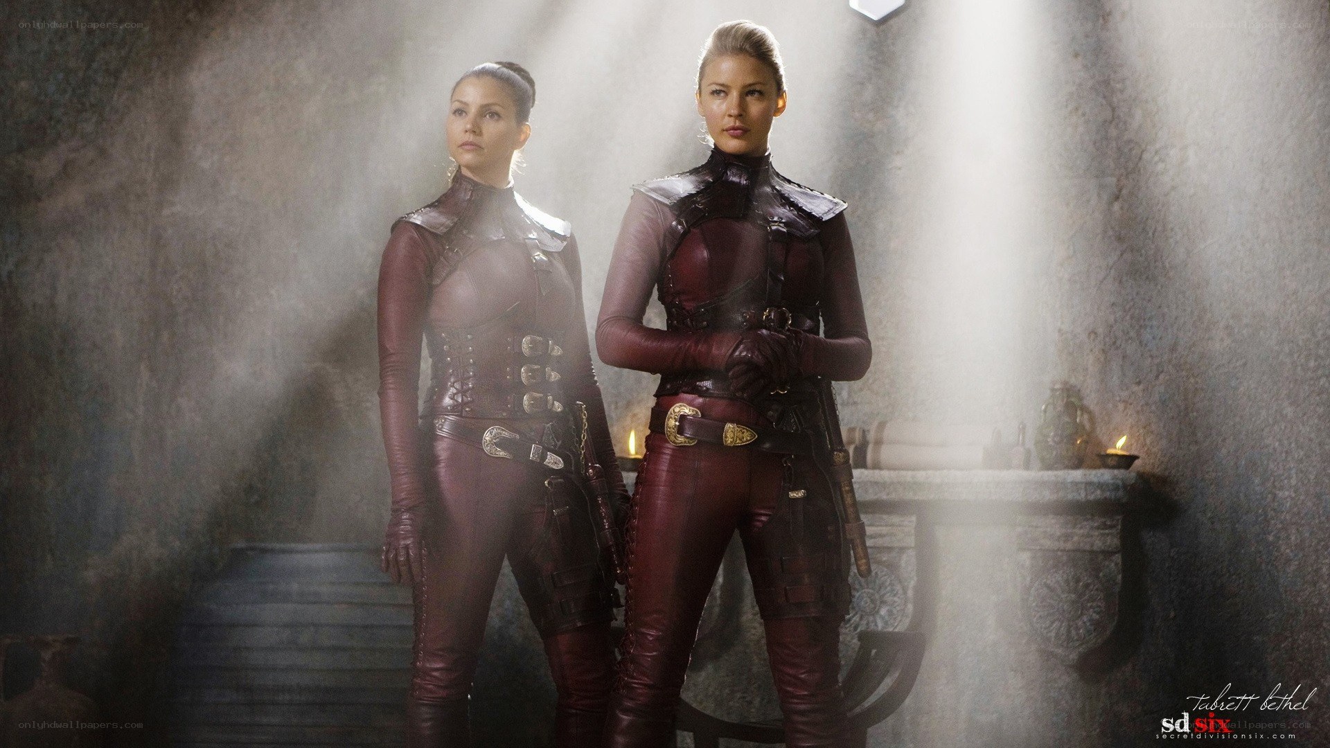 Two women in red armor