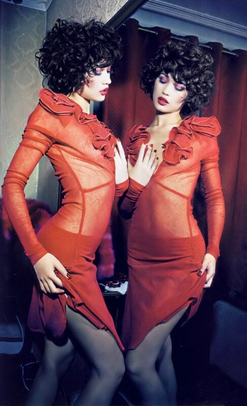 Two women in red dresses