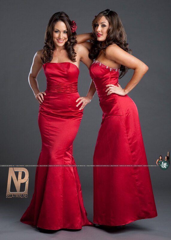 two women in red dresses