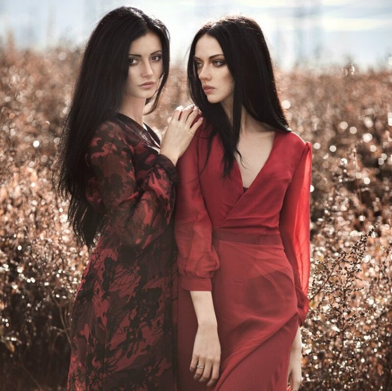 Two Women in Red Dresses — Dramatic, Afternoon