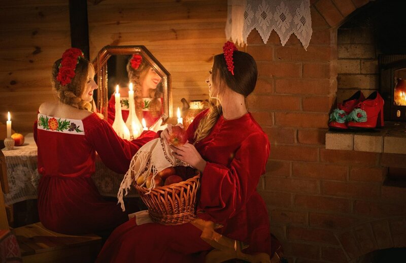 Two Women in Red Dresses — Warm
