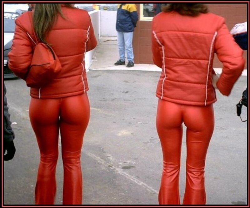 Two women in red outfits