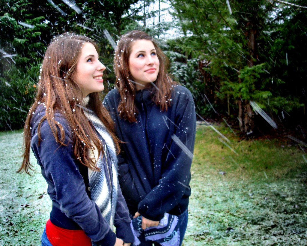 Two women in snowfall