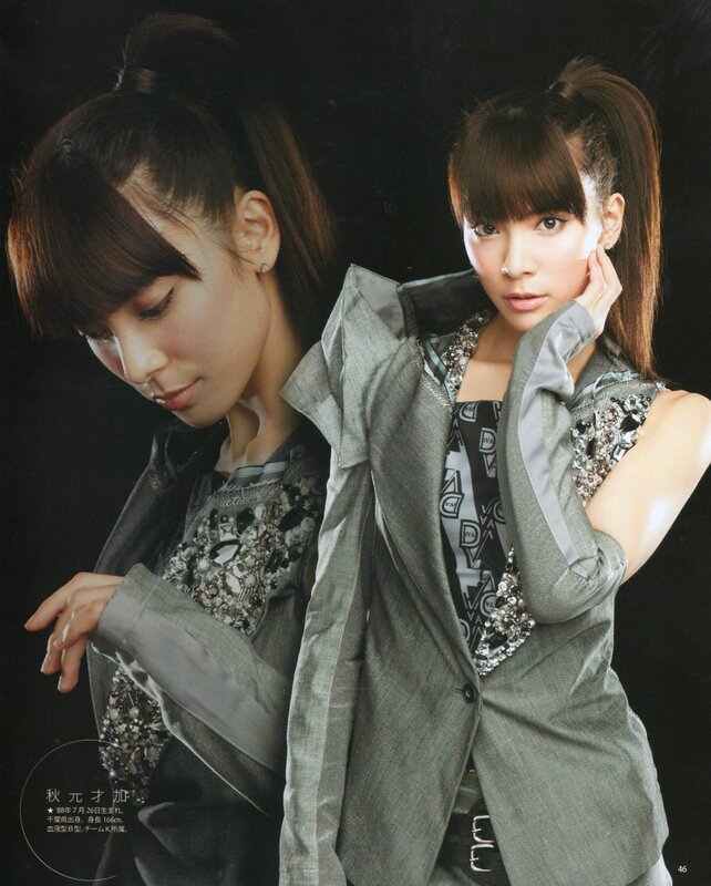 Two women in stylish gray outfits