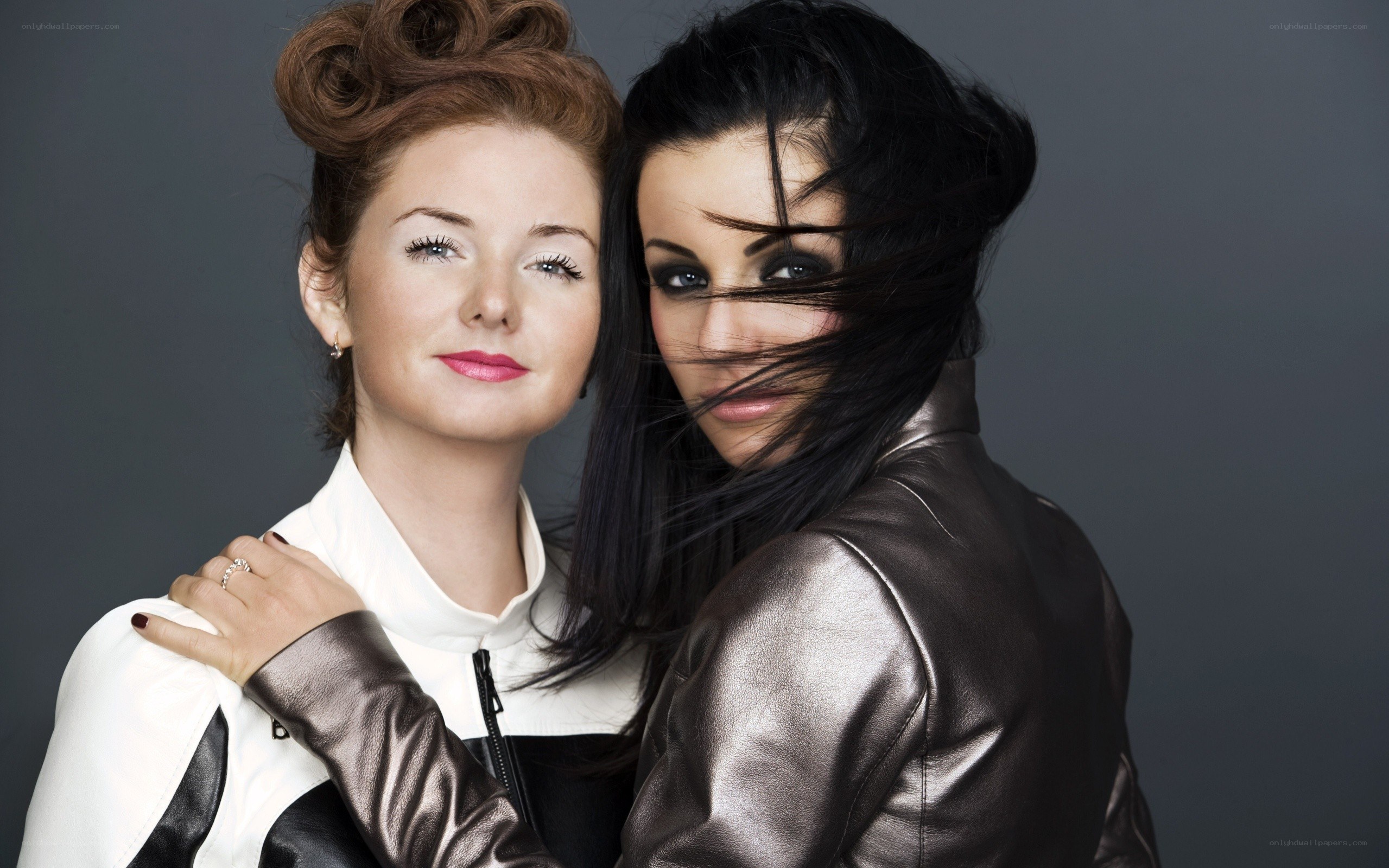 two women in stylish jackets