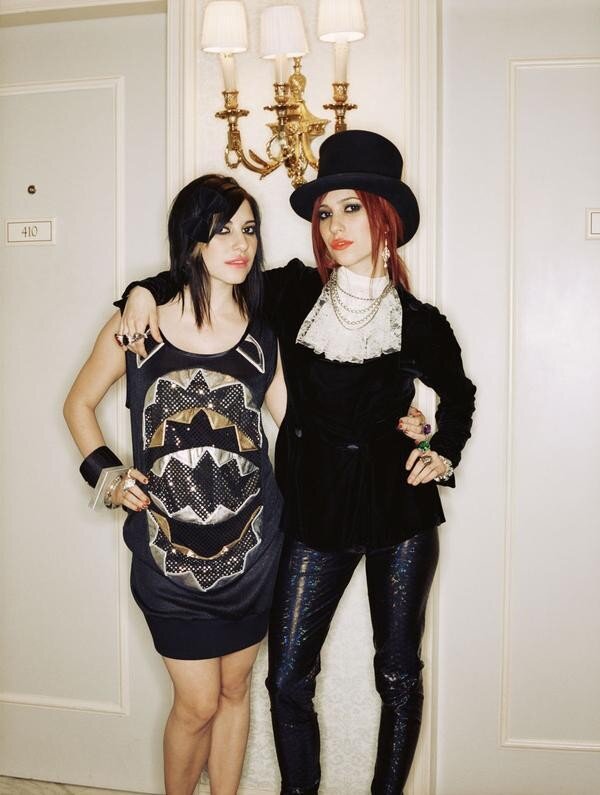 Two women in stylish outfits