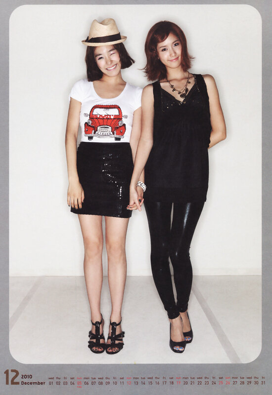 two women in stylish outfits