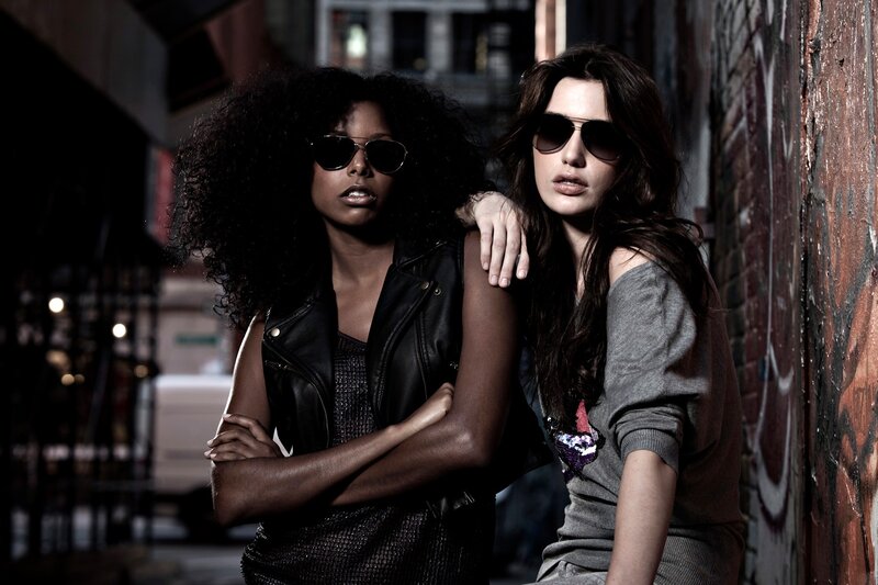 two women in sunglasses on street