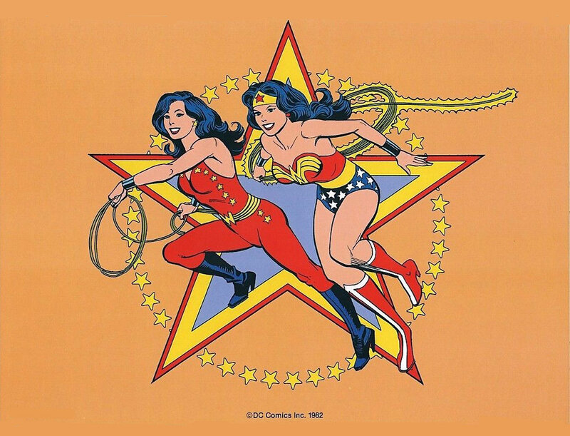 Two Women in Superhero Costumes — Orange