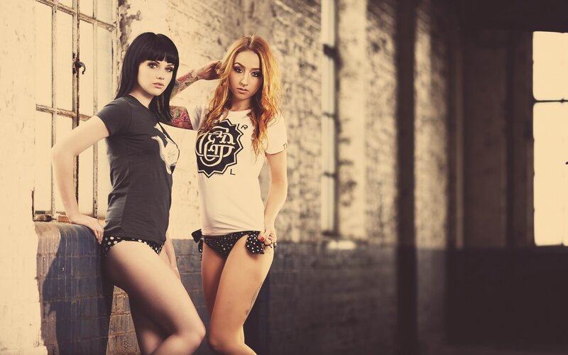Two Women in T-shirts — Black, Confident