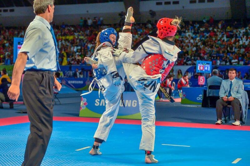 Two Women in Taekwondo — Blue, Competitive, Photograph, Referee