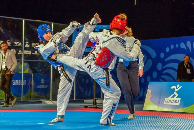 Two Women in Taekwondo — Blue, Intense