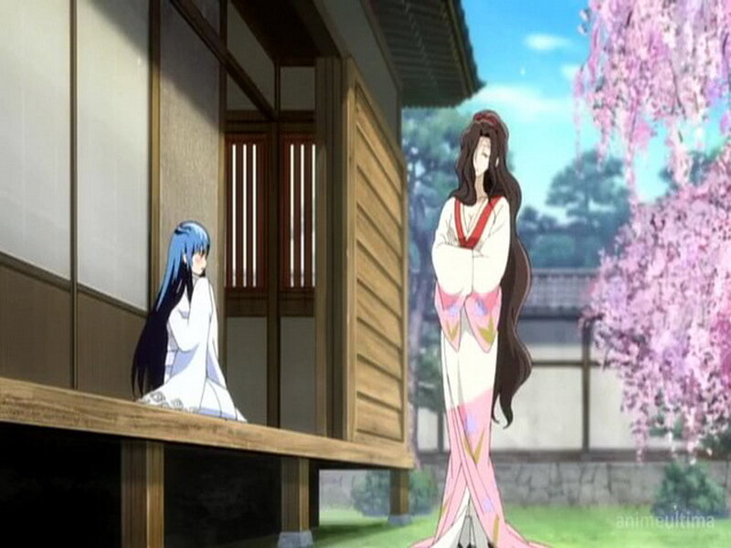 Two Women in Traditional Clothing — White