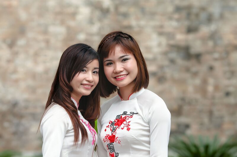 Two women in traditional dresses