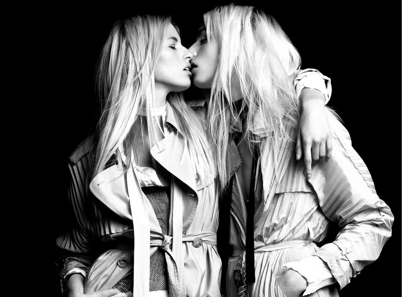 two women in trench coats