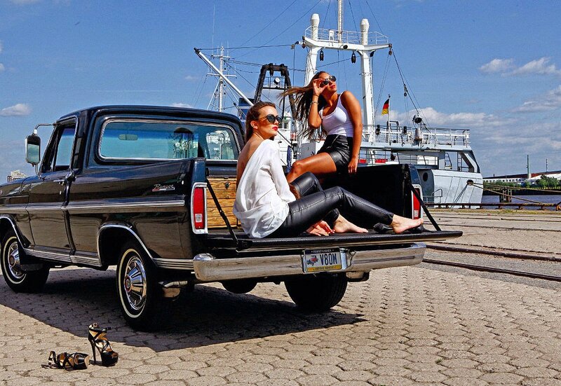 Two Women in Truck Bed