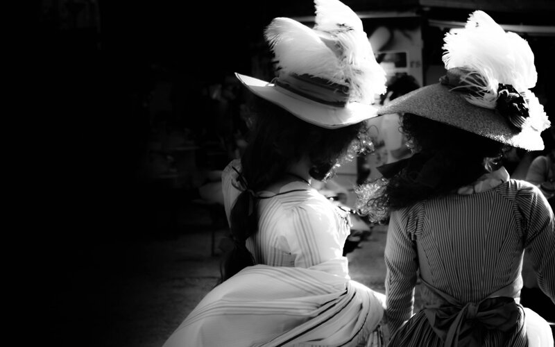 Two women in vintage hats
