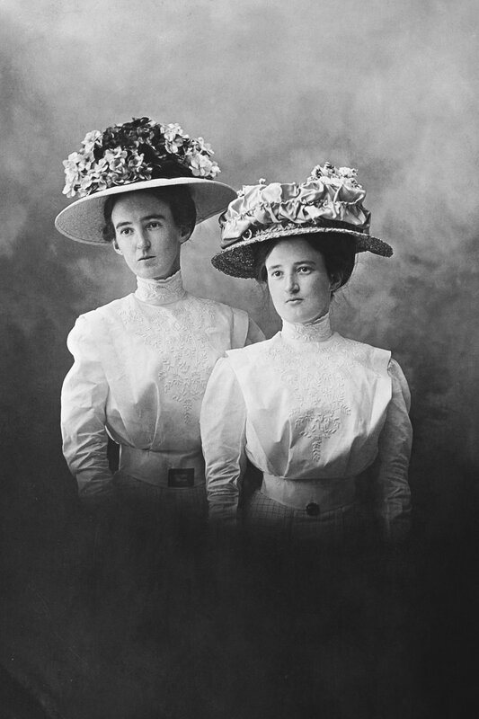Two women in vintage hats