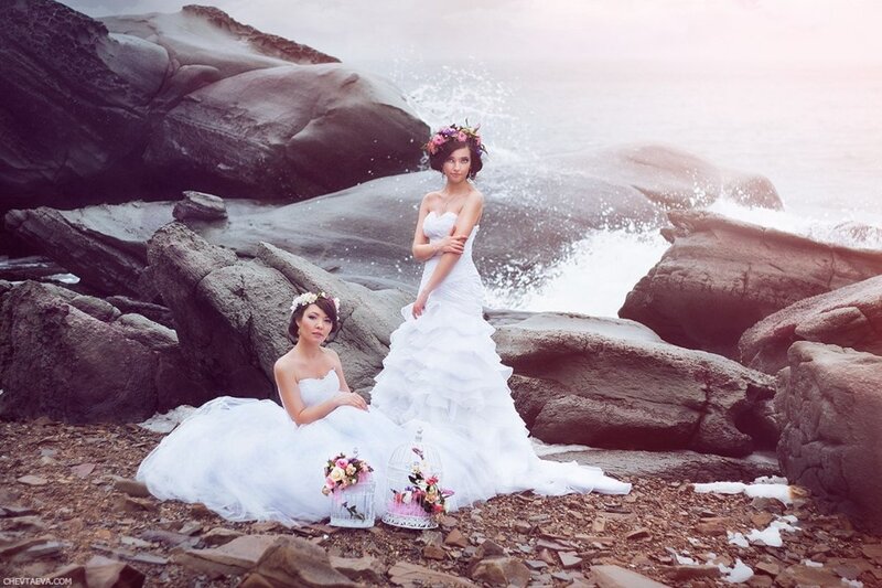 Two Women in Wedding Dresses — White, Dramatic, Sunset