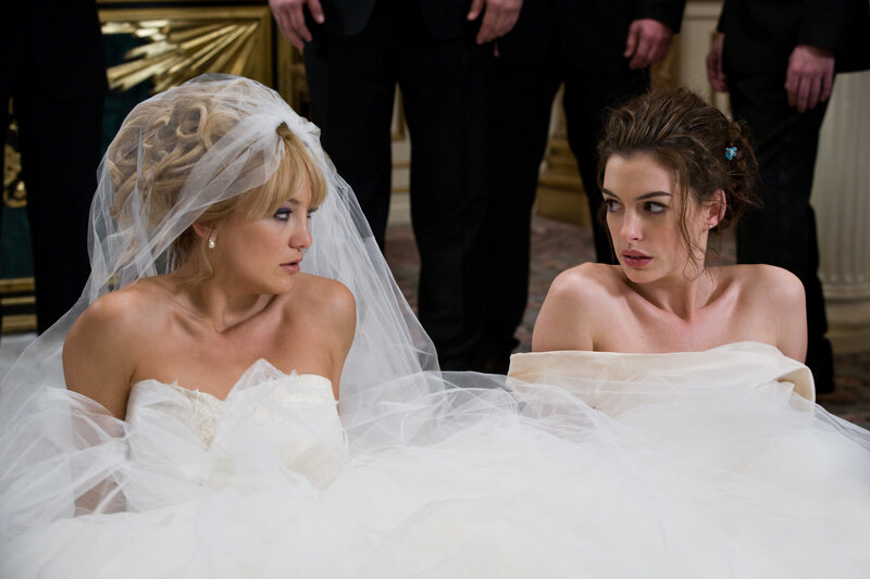 Two Women in Wedding Dresses — White, Dramatic