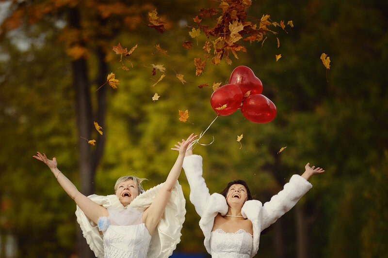 Two Women in Wedding Dresses — White