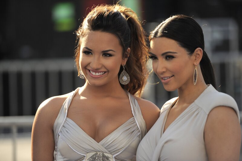 Two women in white dresses