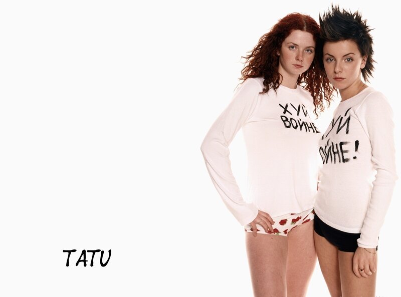 Two women in white shirts
