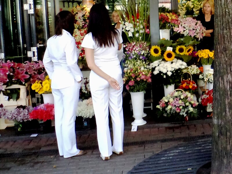Two Women in White Suits — Calm