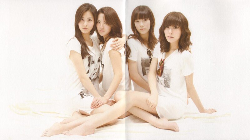 two women in white t-shirts