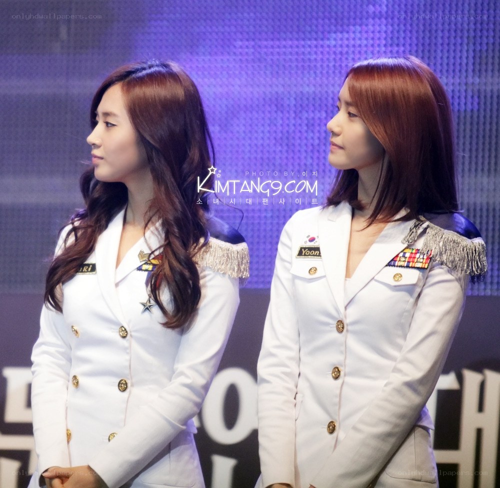 two women in white uniforms