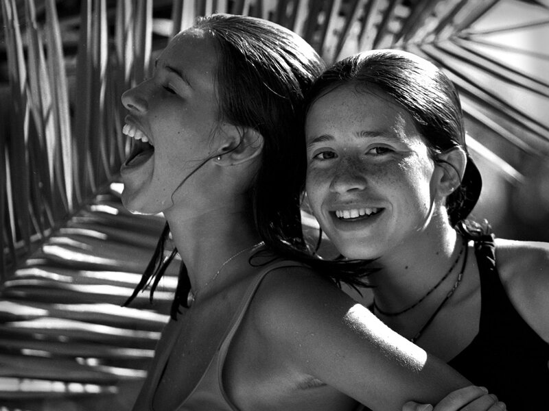 Two Women Laughing — Black, Joyful, Afternoon