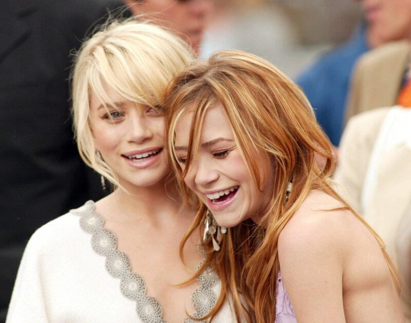 two women laughing together