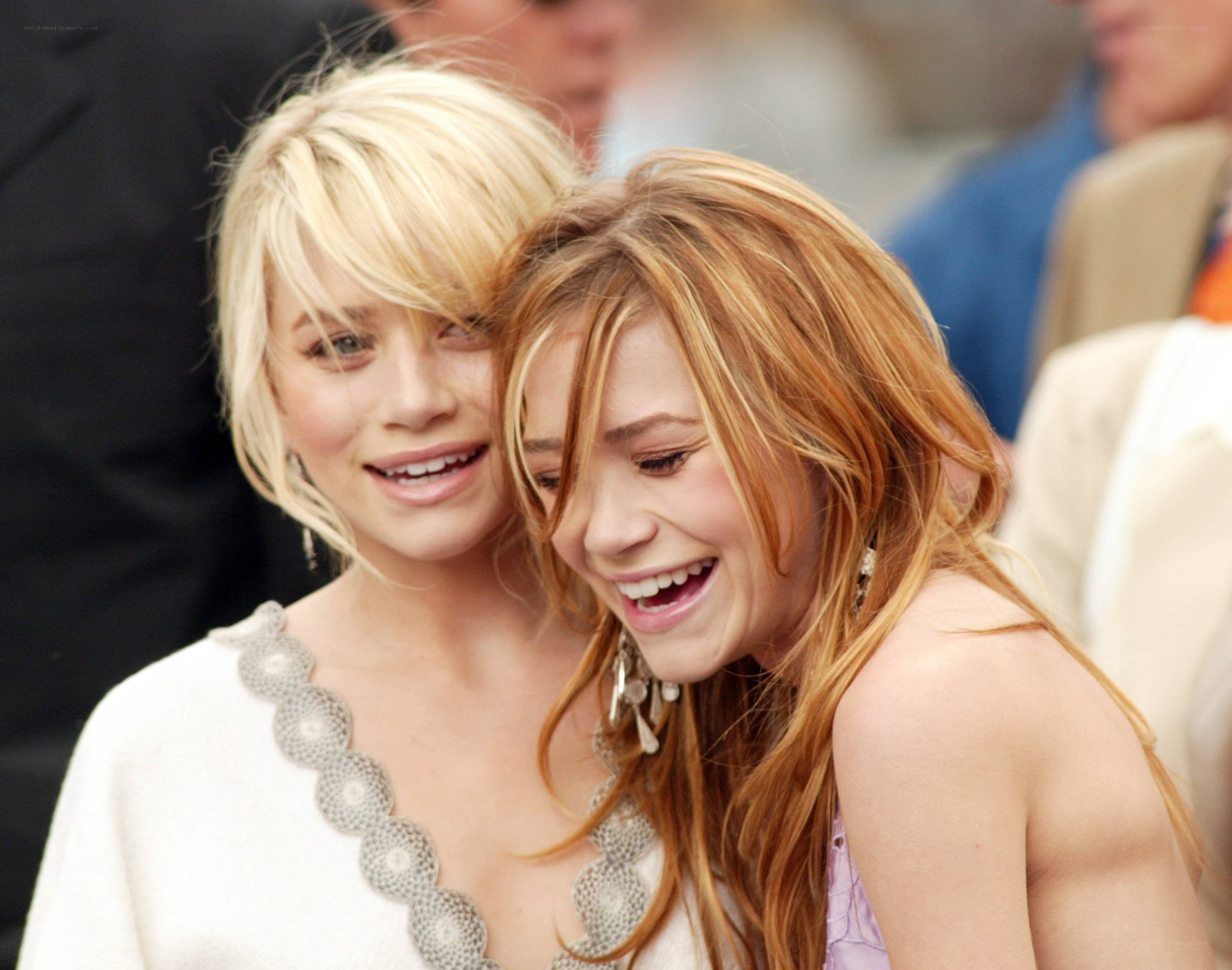 two women laughing together