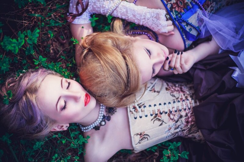 Two Women Lying on Grass — Green