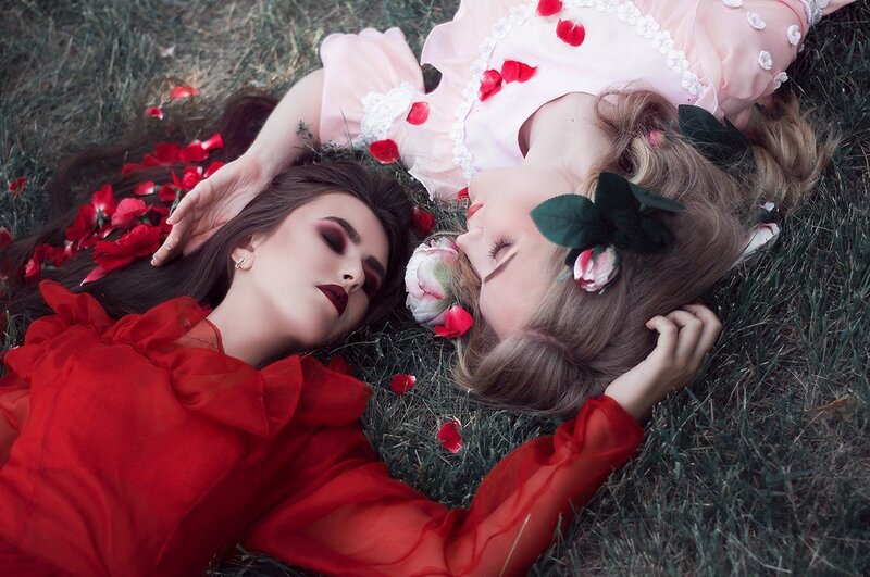 Two Women Lying on Grass — Red