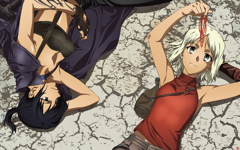 Two Women Lying on Ground