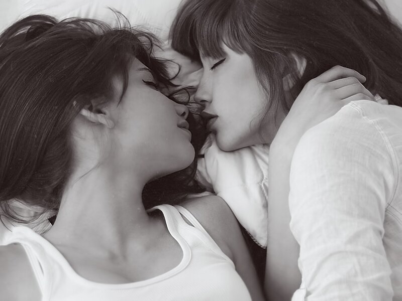 two women lying together