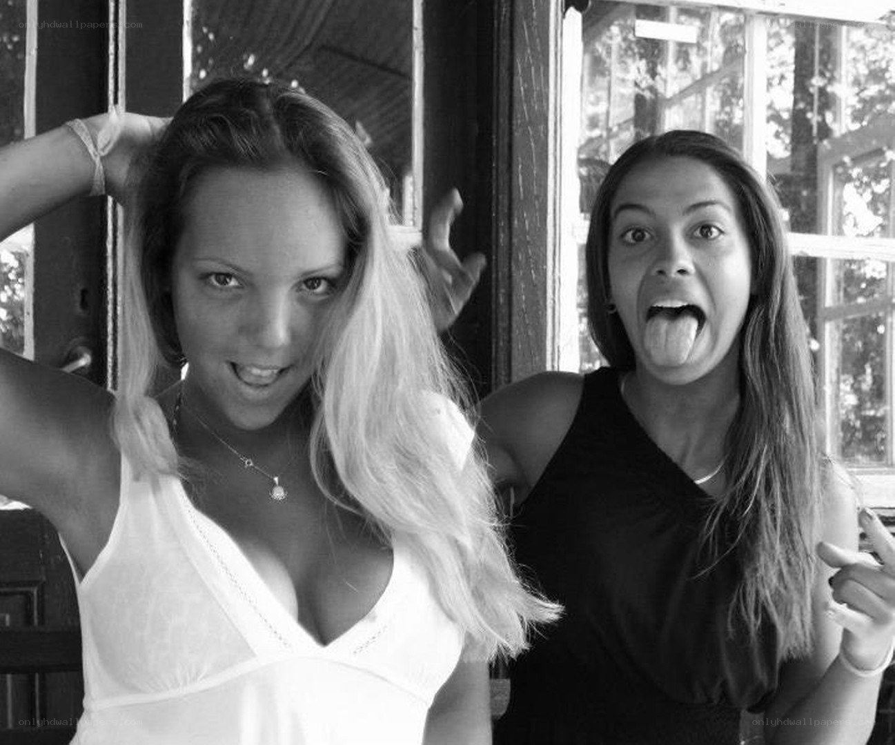 Two women making funny faces