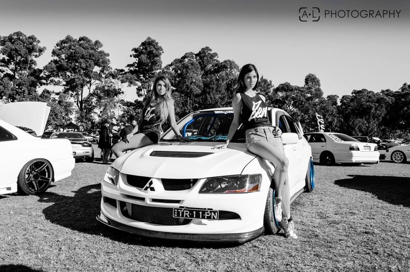 Two Women on a Car — Black