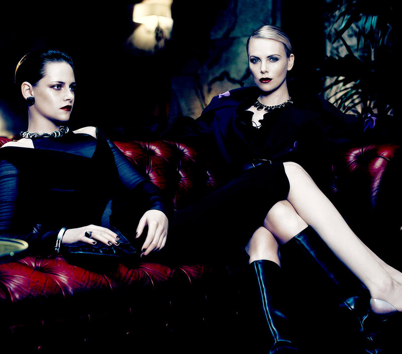 Two Women on a Couch — Black, Dramatic, Night, Photograph