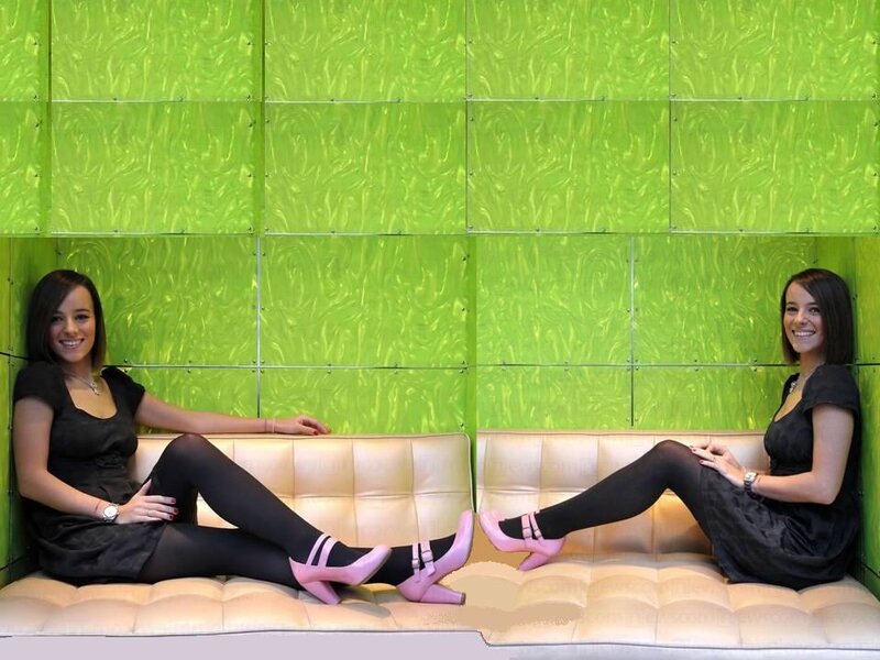 Two Women on a Couch — Green