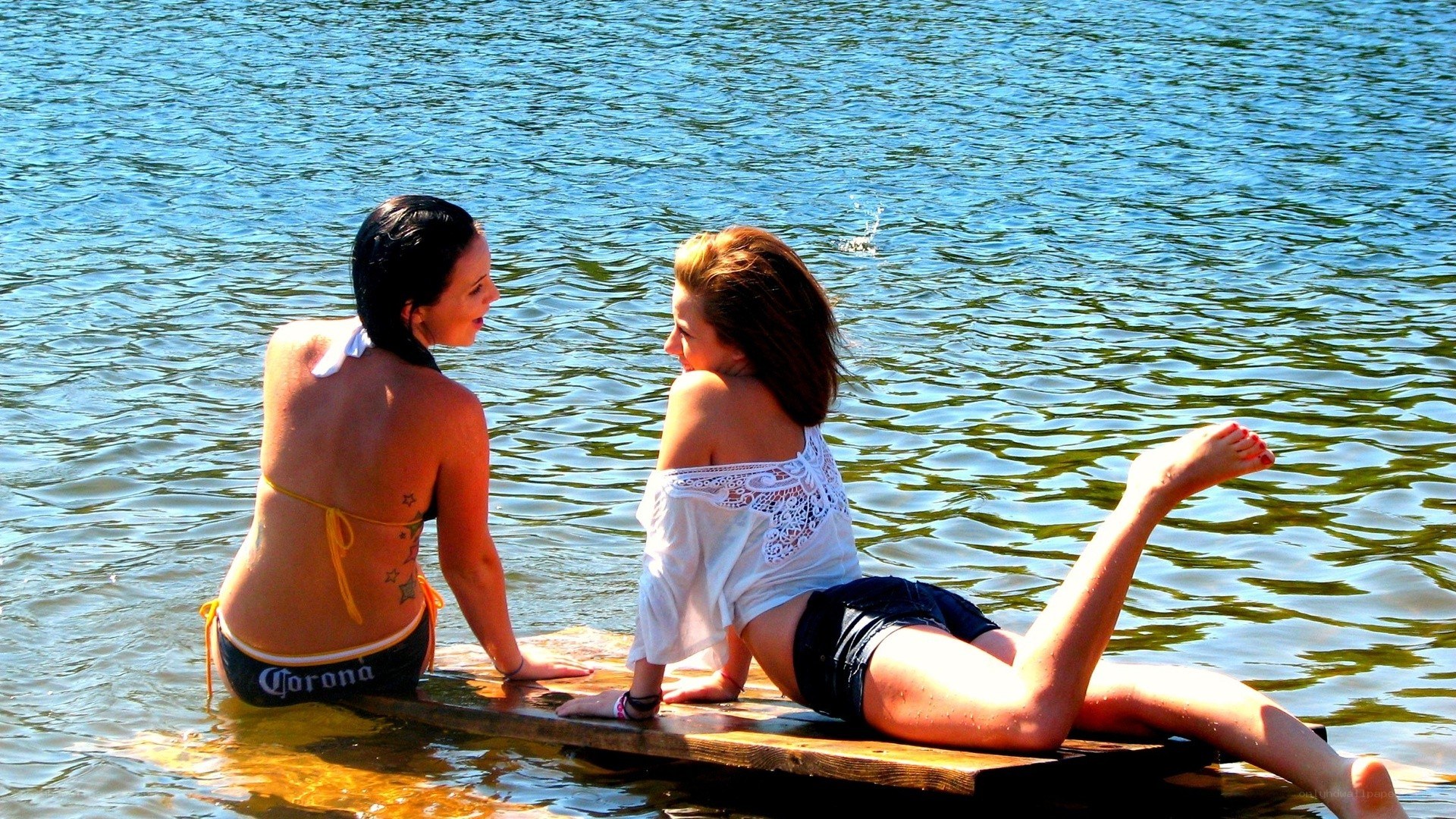 Two women on a dock