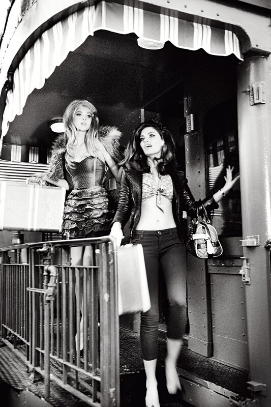 Two women on a train platform