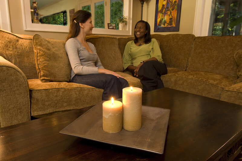 Two Women on Couch — Brown